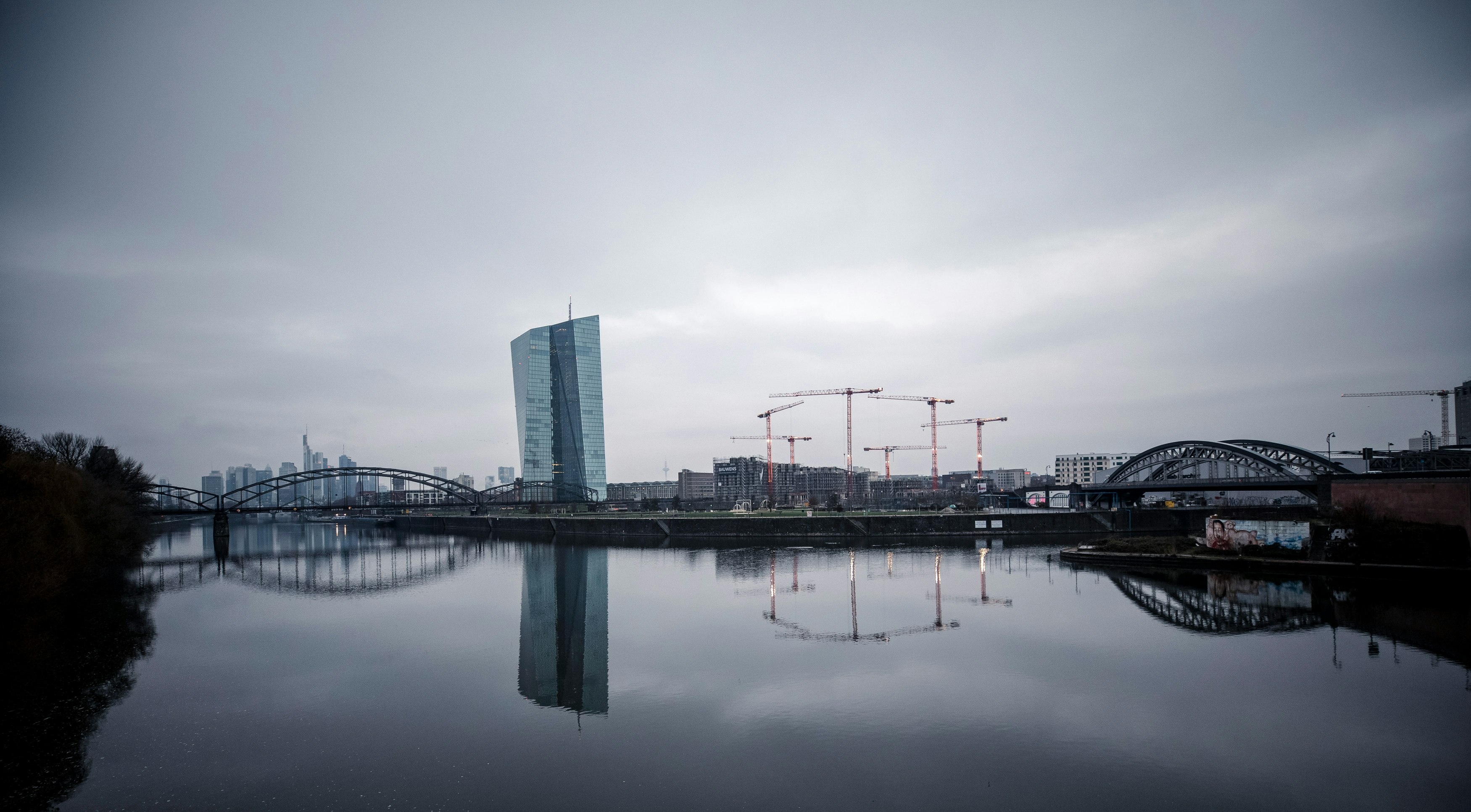 body of water near city buildings during daytime